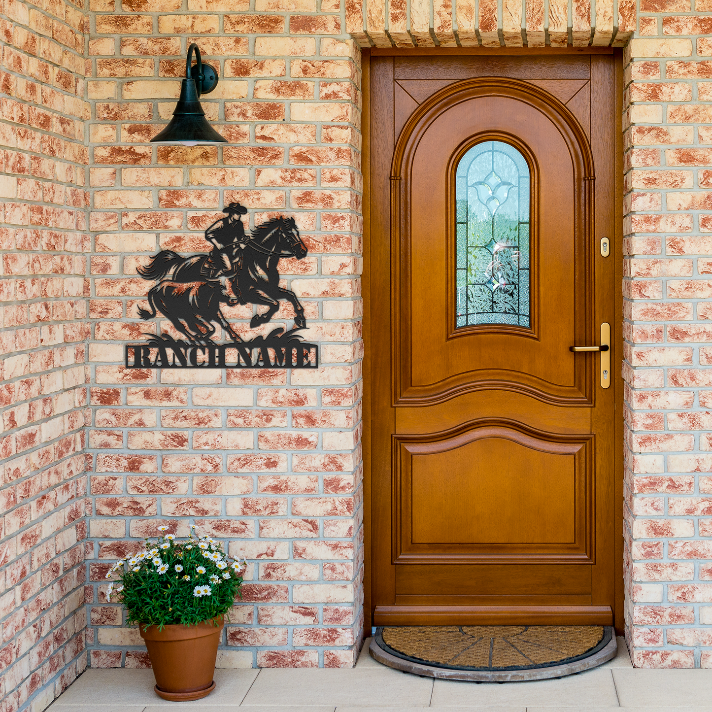 Ranch_Cowboy_Chasing_Cow_Metal_Sign__We_Black_Brick_Entrance_Mockup.png