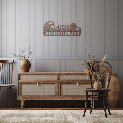 Copper custom coastal ocean wave address metal sign in rustic hallway — personalized house number wall art