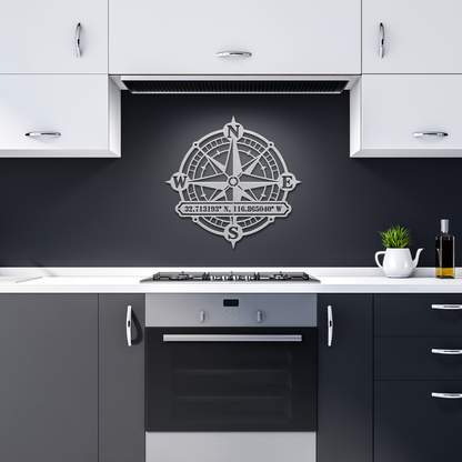 Silver custom compass rose coordinates metal sign in a dark kitchen — personalized keepsake wall decor