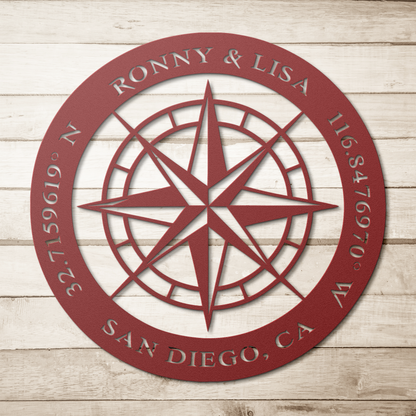 Red custom couples compass coordinates metal sign on a wood background — personalized couples keepsake wall decor