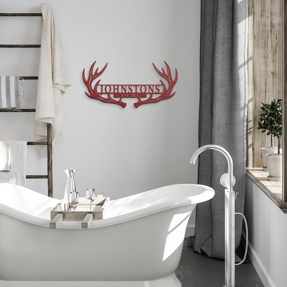 Red custom deer antler family name metal sign in a modern room — personalized rustic cabin wall decor