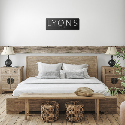 Black custom family name established metal sign in farmhouse room — personalized family name wall art