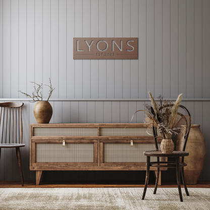 Copper custom family name established metal sign in rustic hallway — personalized family name wall art