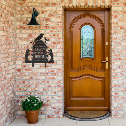 Black custom haunted house halloween metal sign by brick entrance — personalized spooky Halloween decor