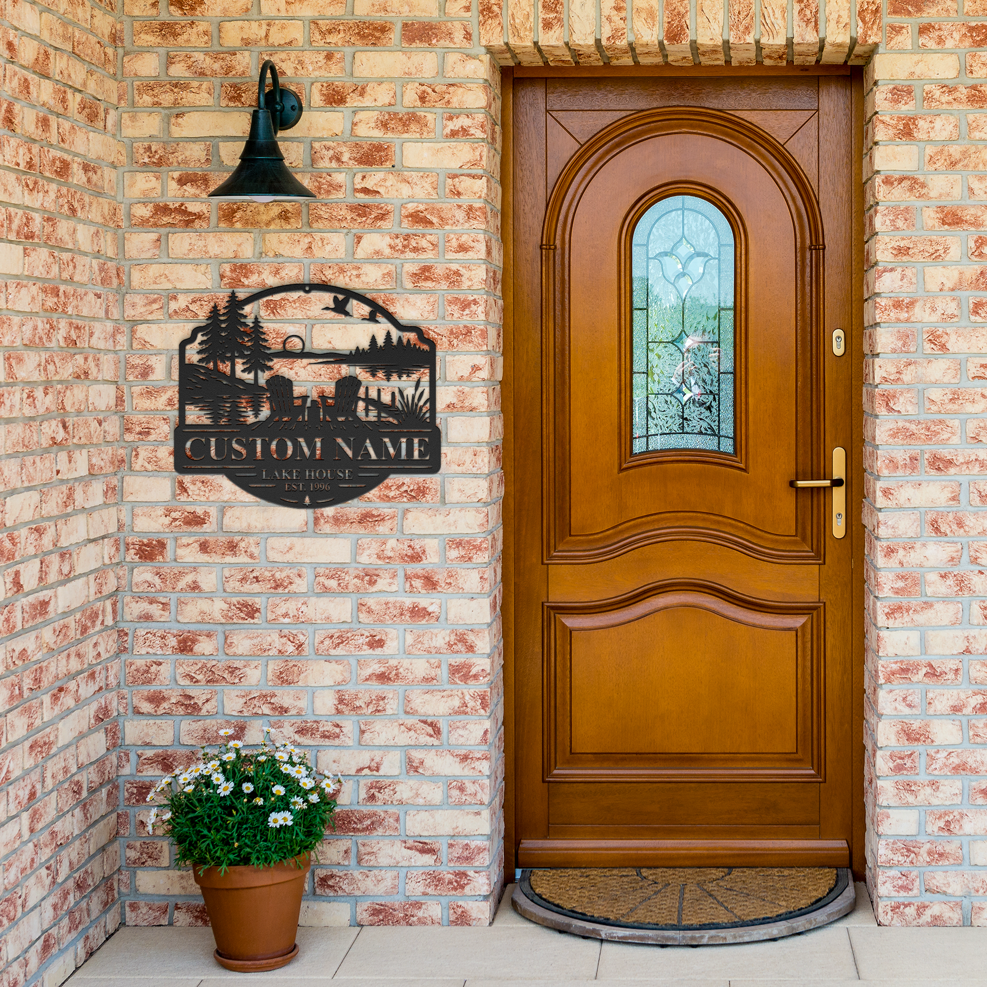 Black custom duck lake house metal sign by brick entrance — personalized lakehouse decor