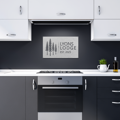 Silver custom pine tree lodge metal sign in dark kitchen — personalized cabin lodge wall art