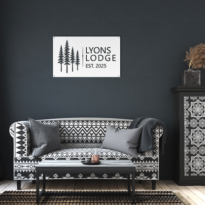 White custom pine tree lodge metal sign in living room — personalized cabin lodge wall art
