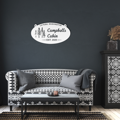 Custom_Oval_Metal_Evergreen_Sign_Persona_White_Dark_Living_Room_Mockup.png_15560079