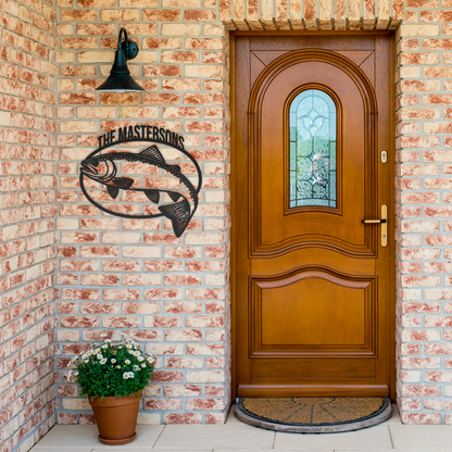 Black custom trout fishing metal sign by brick entrance — personalized angler wall decor