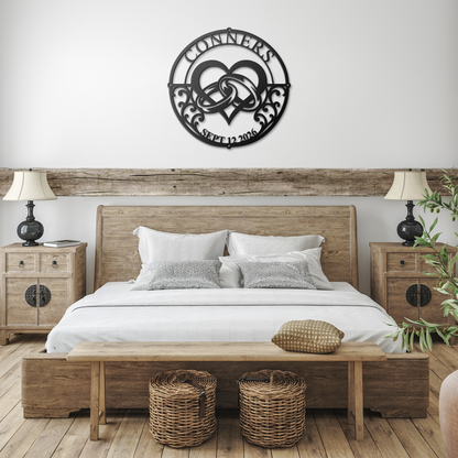 Black custom wedding heart rings metal sign in a farmhouse room — personalized couples wall art