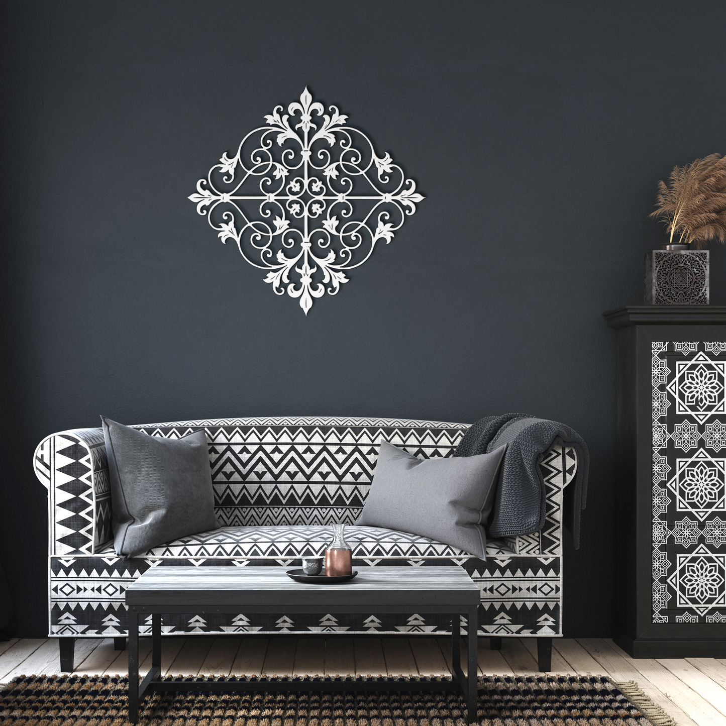 White fleur de lis scrollwork metal wall art in a living room — steel wall decor