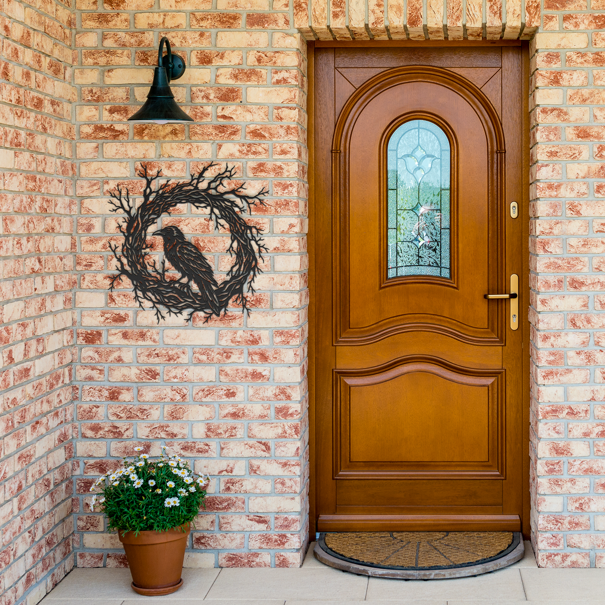 Black gothic raven branch wreath metal wall art by brick entrance — gothic steel wall decor