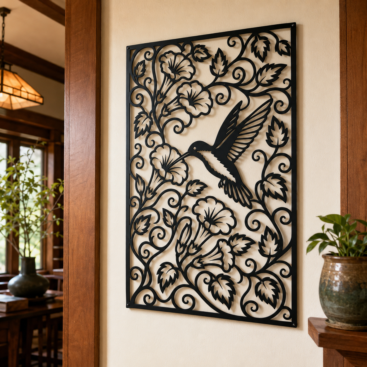 Hummingbird and trumpet flower metal wall art — plasma-cut steel botanical detail