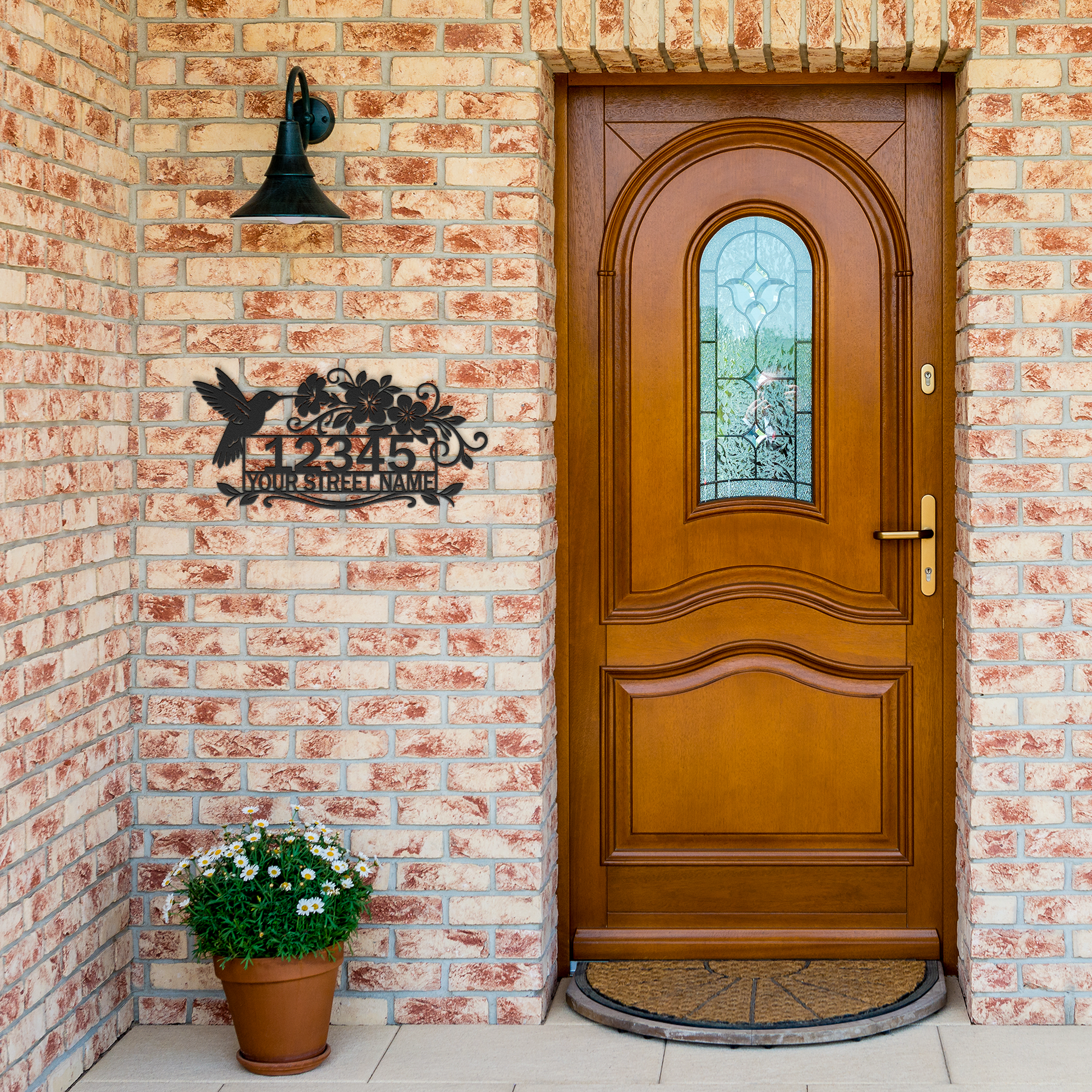 Personalized hummingbird address sign mounted on front porch exterior