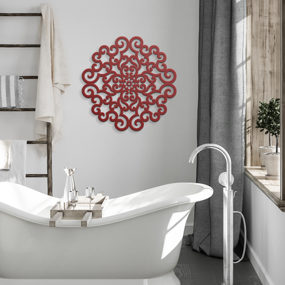 Red ornate scrollwork mandala metal wall art in a modern room — steel wall decor