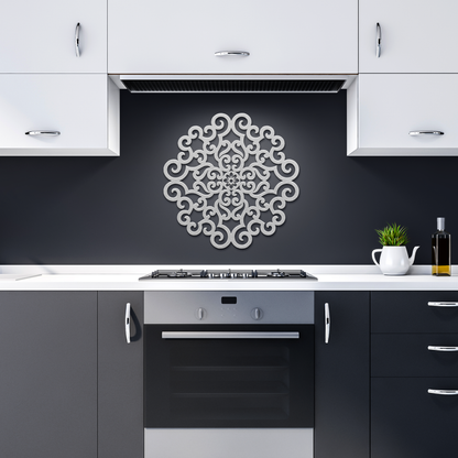 Silver ornate scrollwork mandala metal wall art in a dark kitchen — steel wall decor