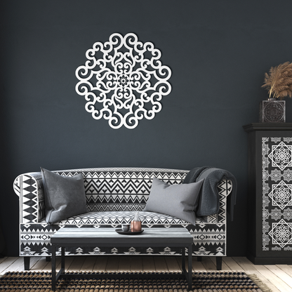 White ornate scrollwork mandala metal wall art in a living room — steel wall decor