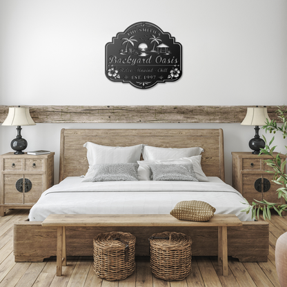 Backyard oasis personalized metal sign size comparison — 12-inch and 24-inch versions on a natural wood background

