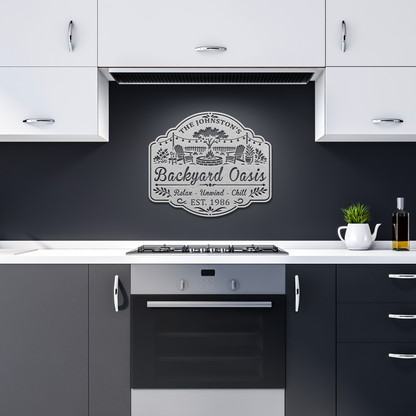Personalized_Backyard_Oasis_Metal_Sign__Silver_Dark_Kitchen_Mockup.png_15791102