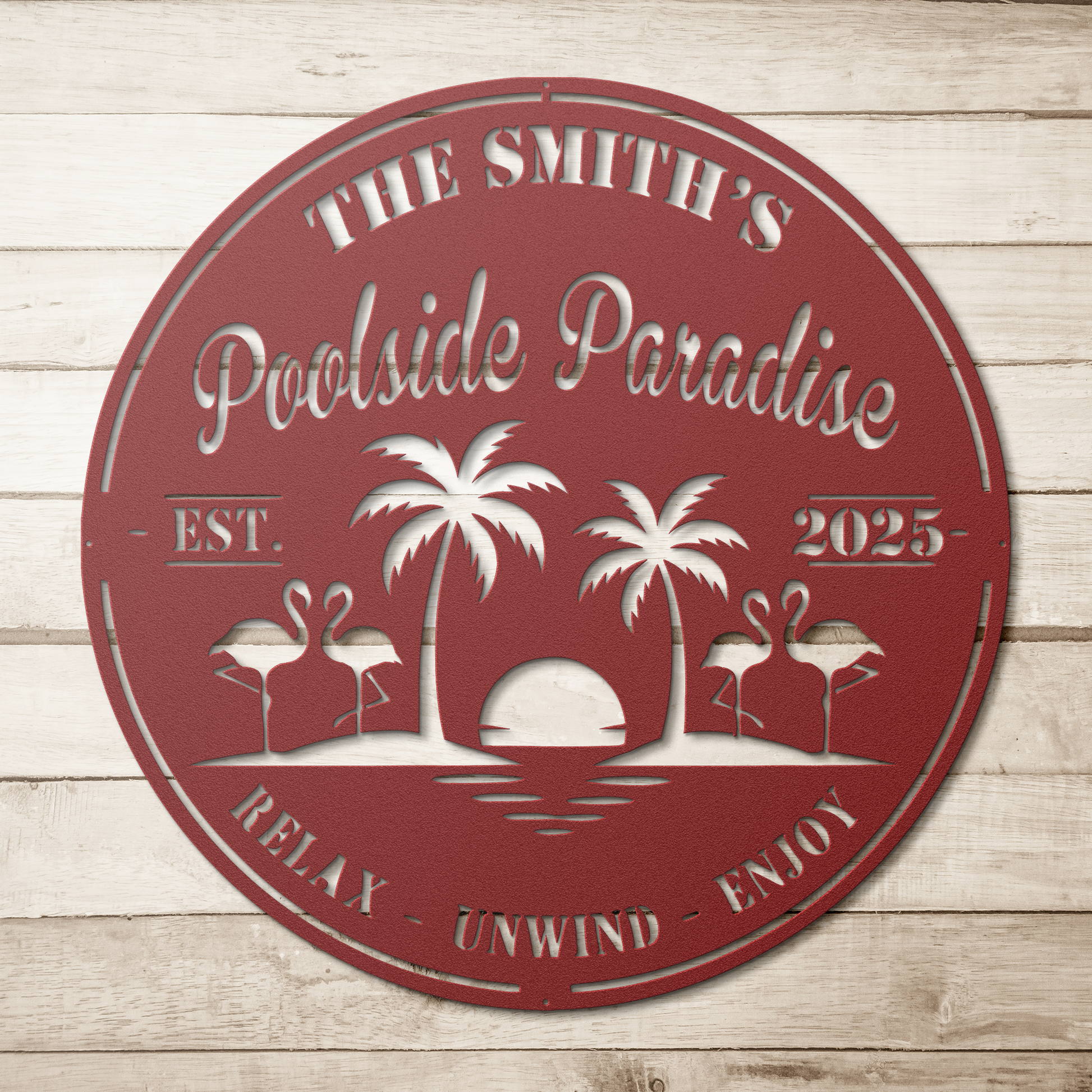 Poolside paradise metal sign size comparison — 12-inch and 24-inch round steel signs side by side on natural wood
